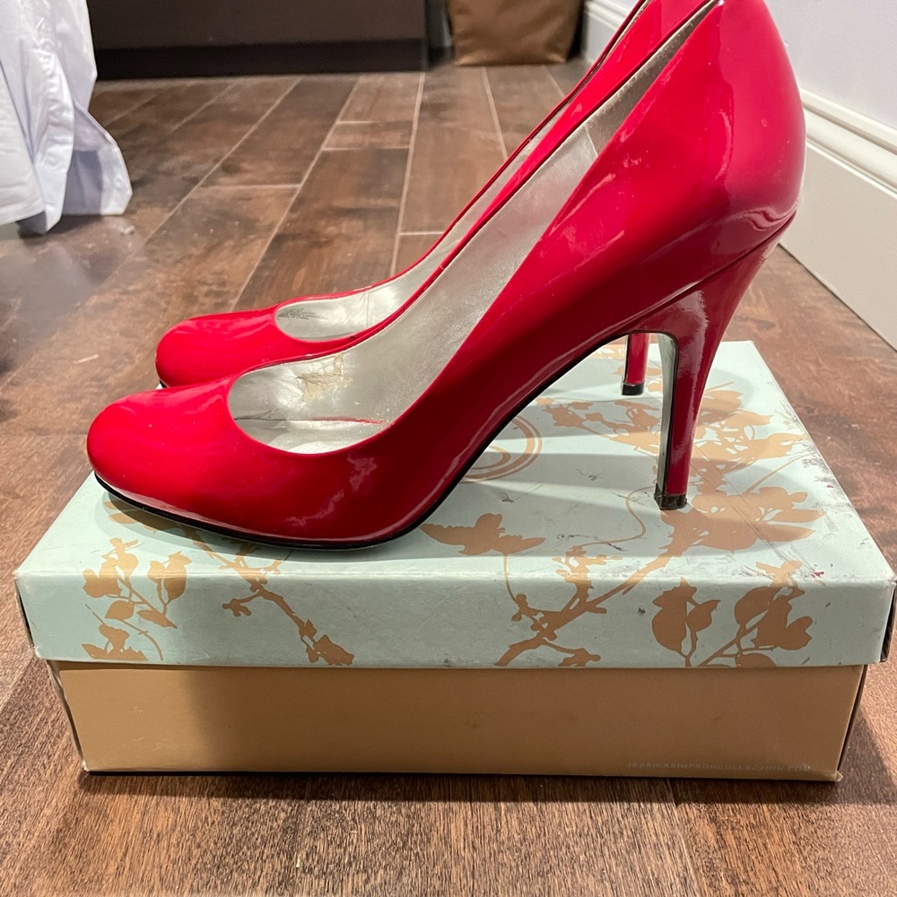 Red Jessica Simpson Stiletto pumps, worn only a couple of times. Size 10.